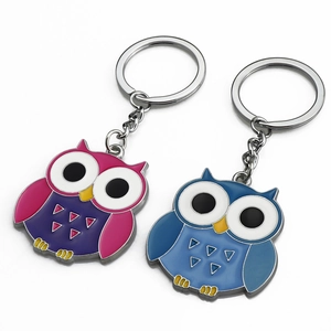 Pair of cartoon owl keychains in pink and blue enamel alloy with metal rings