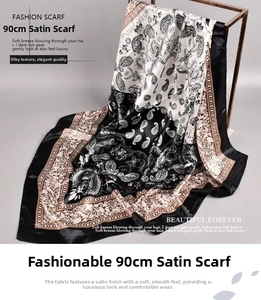 Close-up of black and white paisley pattern on 90cm satin silk square scarf with glossy finish
