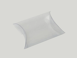 Close-up of a clear PVC pillow-shaped gift box for wedding favors and small jewelry