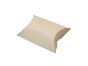 Macro view of beige pillow-shaped gift box with matte finish for candy or jewelry