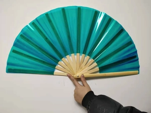 Detail showing the laser blue transparent PVC surface and bamboo ribs of the Kung Fu fan