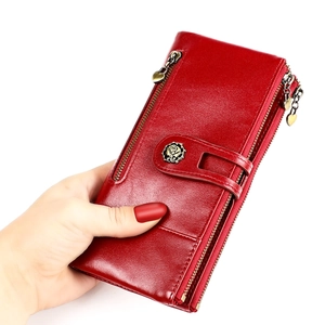 Red RFID blocking leather long wallet for women with double zipper and rose buckle detail