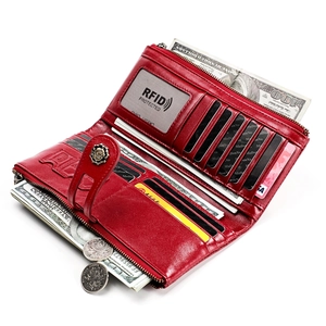 Internal view of red leather long wallet showing RFID protection and card slots