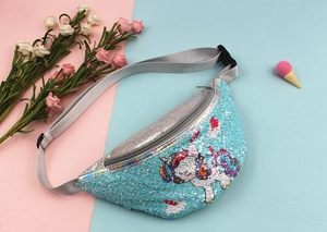 Detailed view of sequined unicorn waist bag on a pastel decorative background