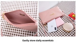 Pink lychee texture crossbody bag featuring V-shaped stitching and gold logo detail
