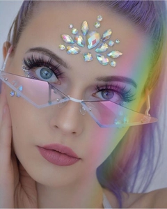 Close-up of rimless polygon sunglasses with rainbow laser lenses and crystal face jewels