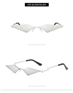 Detail of silver rimless geometric sunglasses showing unique diamond cut lenses and metal frame