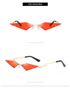 Detail view of red rimless geometric sunglasses with gold lightning-shaped metal temples