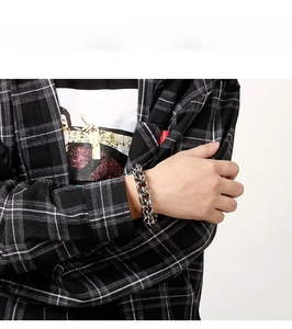 Close-up of retro silver thick link chain bracelet in stainless steel for men