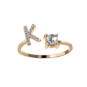 Adjustable gold letter K ring with sparkling cubic zirconia stones and 18K plating