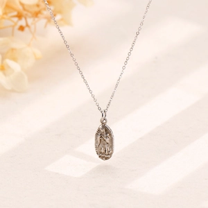 Vintage stainless steel oval medallion pendant necklace with portrait relief for men and women