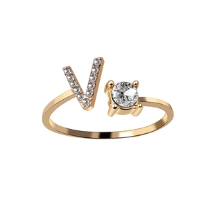 Adjustable gold ring with crystal-encrusted letter V and round zircon stone