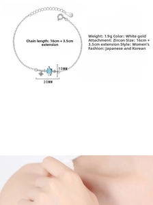 Detail view showing 16cm planet bracelet dimensions with star charms and 3.5cm extension