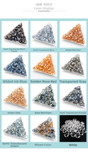 Macro display of twelve multi-colored glass ring beads for DIY nail art and jewelry making
