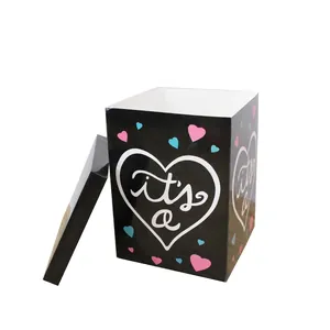Boîte cadeau surprise pour révélation de genre en noir avec cœur blanc pour baby shower