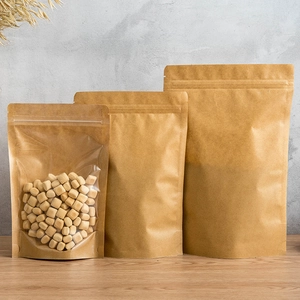 Three sizes of kraft paper stand-up pouches with clear windows for food packaging