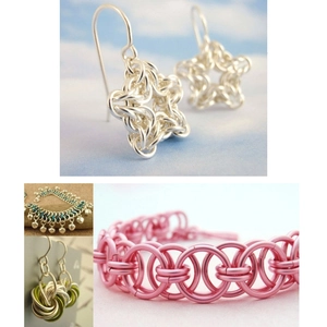 Macro shot of assorted DIY jewelry pieces crafted with colorful woven aluminum wire
