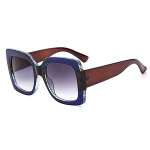 Lunettes de soleil carrées rétro avec monture bleue scintillante et verres dégradés