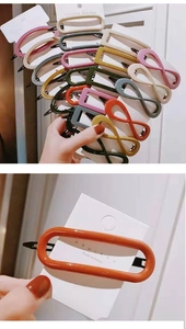 Detail shot of assorted Korean style acrylic hair clips in multiple colors and shapes