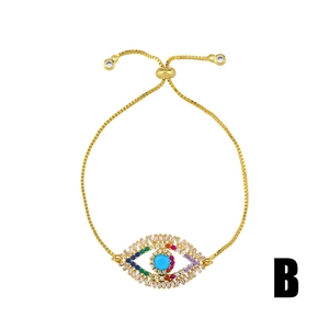 Adjustable golden Evil Eye bracelet with colorful zircon stones and rectangular crystals