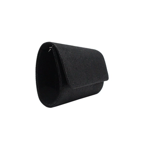 Detail view of a black glitter evening clutch bag with an elegant envelope flap design