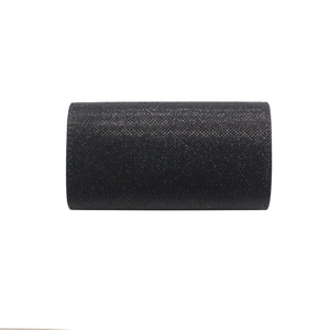 Macro shot of minimalist black glitter evening clutch bag with crosshatch shimmer texture