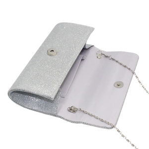 Silver sequin clutch bag with metal magnetic closure and detachable chain strap
