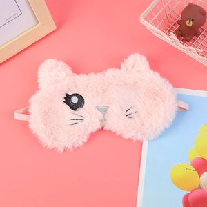 Cute pink plush cat sleep mask with embroidery on vibrant pastel background