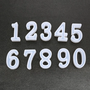 DIY silicone number molds set 0-9 for resin casting and keychains on black background