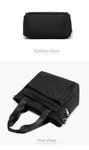 Detailed view of black nylon tote bag with bottom panel and side zipper pockets