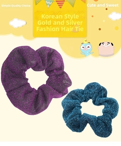 Detailed view of shiny metallic scrunchies in purple and teal with shimmering texture