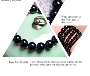 Macro detail of high-polish black agate beads with mirror finish and multi-layered design