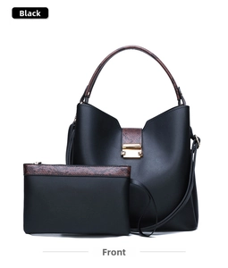 Front view of black leather handbag set with brown snakeskin pattern handles and gold buckle