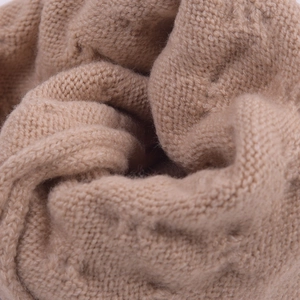 Winter chunky cable knit beanie hat in beige with warm thick yarn texture detail