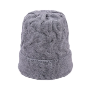 Detailed texture of mid-grey knit beanie with thick cable stitch and ribbed brim detail