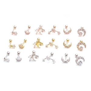 Surgical steel star and moon ear stud set with zircon crystals in gold and silver