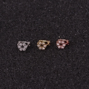 Set of three mini flower cartilage ear cuffs with crystals in silver, gold, and rose gold
