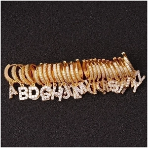 Gold letter earrings with crystal zircon pendants in a complete A-Z alphabet collection