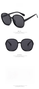 Front and side views of oversized round black frame sunglasses with dark grey lenses