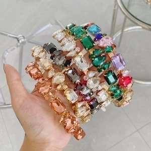 Close-up of luxury baroque headbands with vibrant multi-colored crystal rhinestones