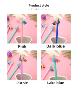 Detailed view of creative peacock gel pens in four colors within a ceramic holder