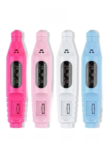 Detail view of colorful portable nail drills with speed control and various body colors