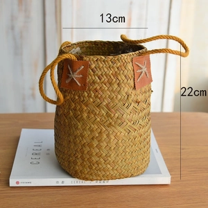 Handwoven natural seagrass flower basket with hemp handles and leather patches, 22cm height