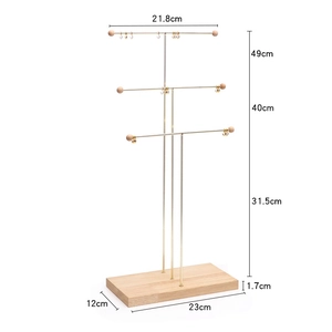 Three-tier metal jewelry display stand with wooden base showing detailed dimensions