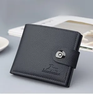 Close-up of black litchi pattern leather wallet with snap buckle and embossed logo