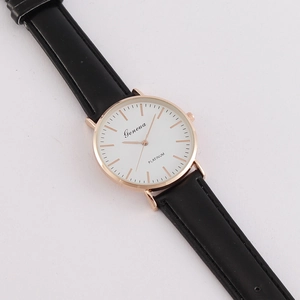 Minimalist men's quartz watch with white dial, rose gold case and black leather strap