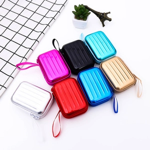 Mini suitcase earphone storage cases in multiple colors with carrying straps