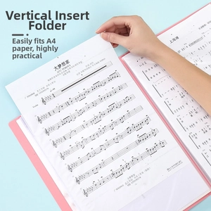Pink A4 display book with transparent sleeves showing a sheet music insertion detail