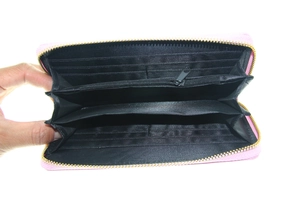 Detailed interior of pink laser PU wallet with multiple card slots and zipper pocket