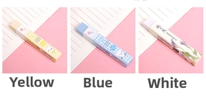 Detailed view of colorful cartoon long strip erasers with protective printed paper sleeves